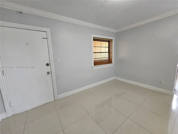 a kitchen with stainless steel appliances granite countertop a refrigerator stove a sink dishwasher and microwave