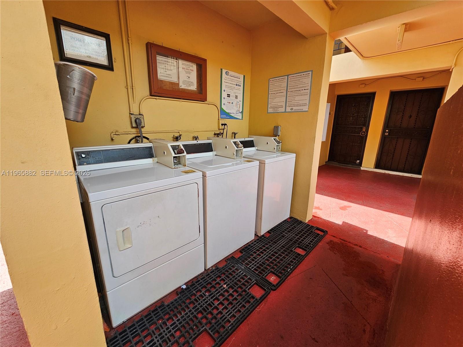 47 Northwest 47th Avenue, Unit 16 Miami, FL 33126 - Photo 9 of 10 a utility room with dryer and washer