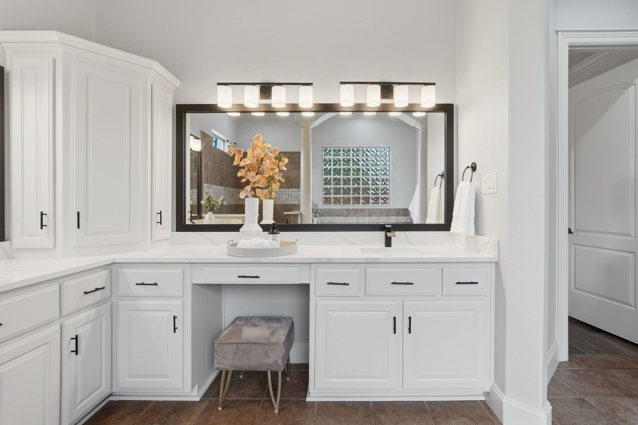 7603 Hogan Bridge Court Spring, TX 77389 - Photo 21 of 50 Framed mirrors and a dedicated vanity area add a refined touch.