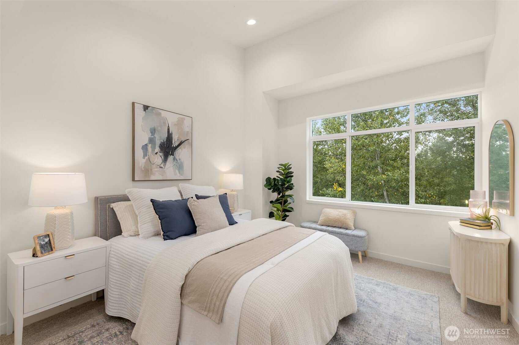 16008 Main View Lane Northeast Duvall, WA 98019 - Photo 13 of 26 a bedroom with a large bed and a large window