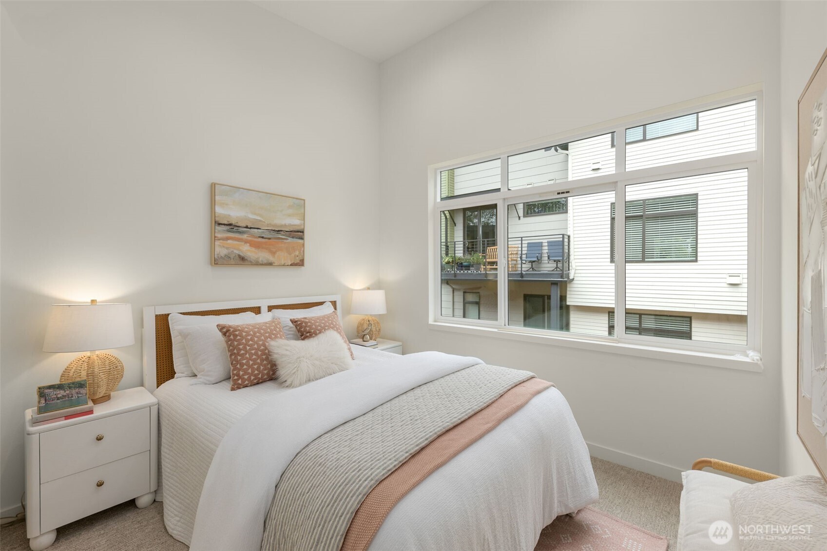 16008 Main View Lane Northeast Duvall, WA 98019 - Photo 18 of 26 a bedroom with a bed and a large window