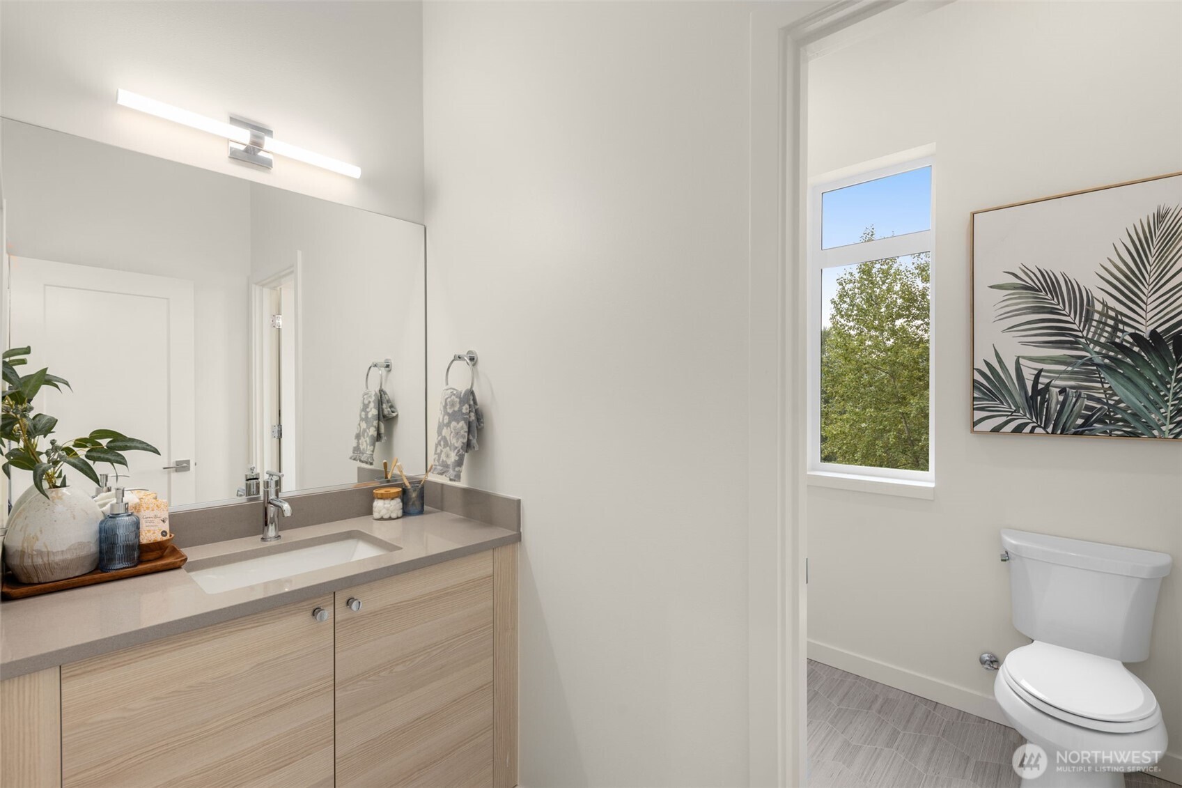 16008 Main View Lane Northeast Duvall, WA 98019 - Photo 19 of 26 a bathroom with a toilet a sink and mirror