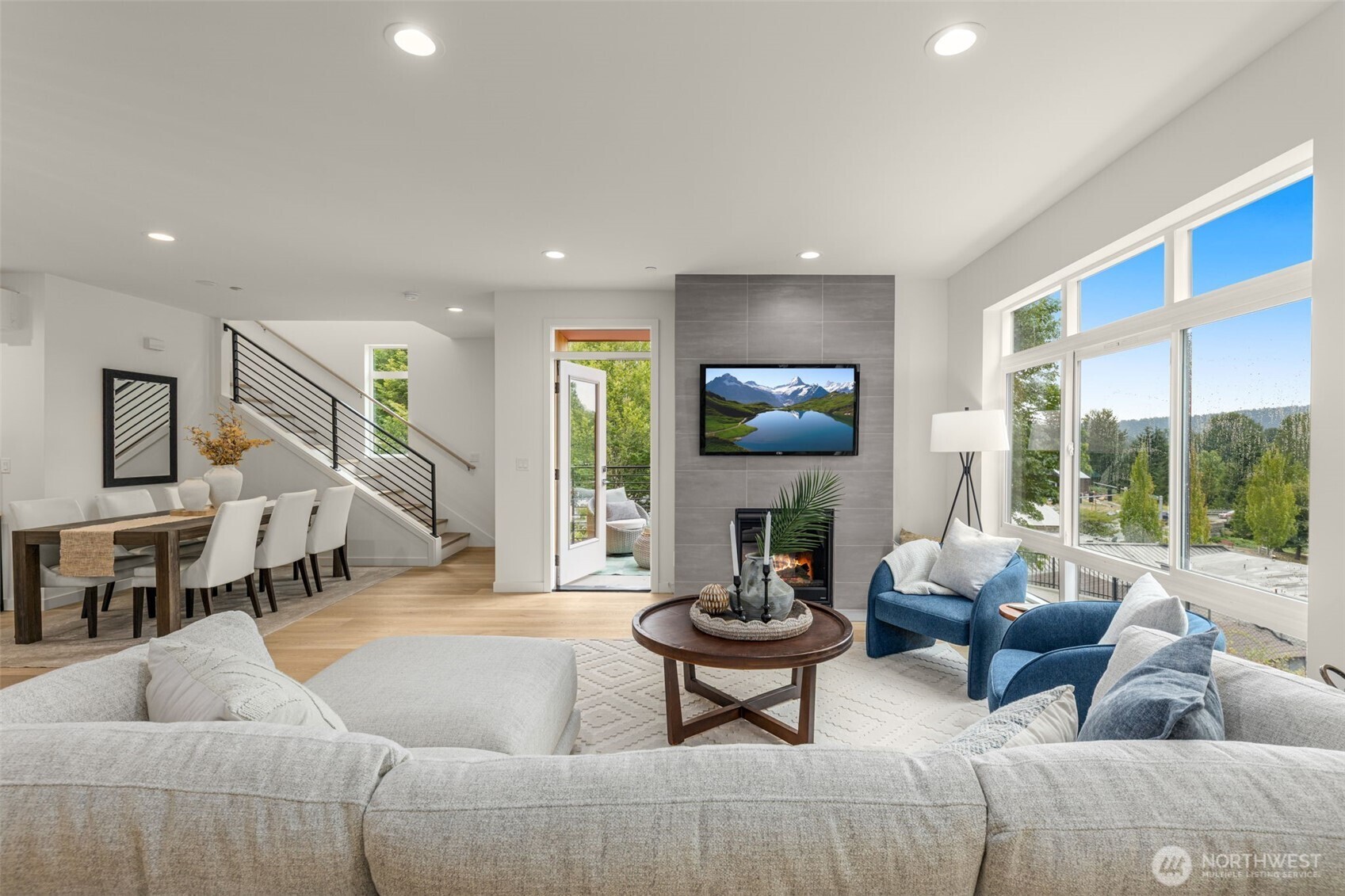 16008 Main View Lane Northeast Duvall, WA 98019 - Photo 8 of 26 a living room with furniture and a large window