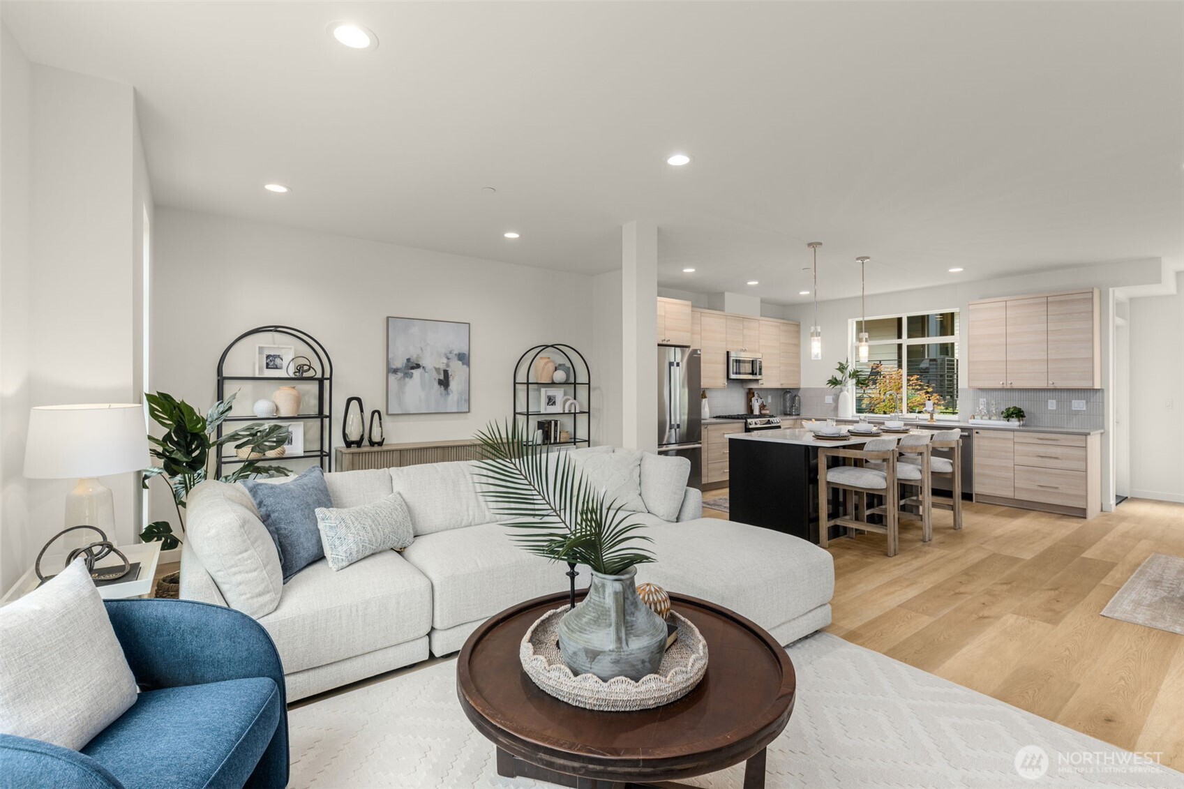 16008 Main View Lane Northeast Duvall, WA 98019 - Photo 9 of 26 a living room with furniture kitchen view and a dining table