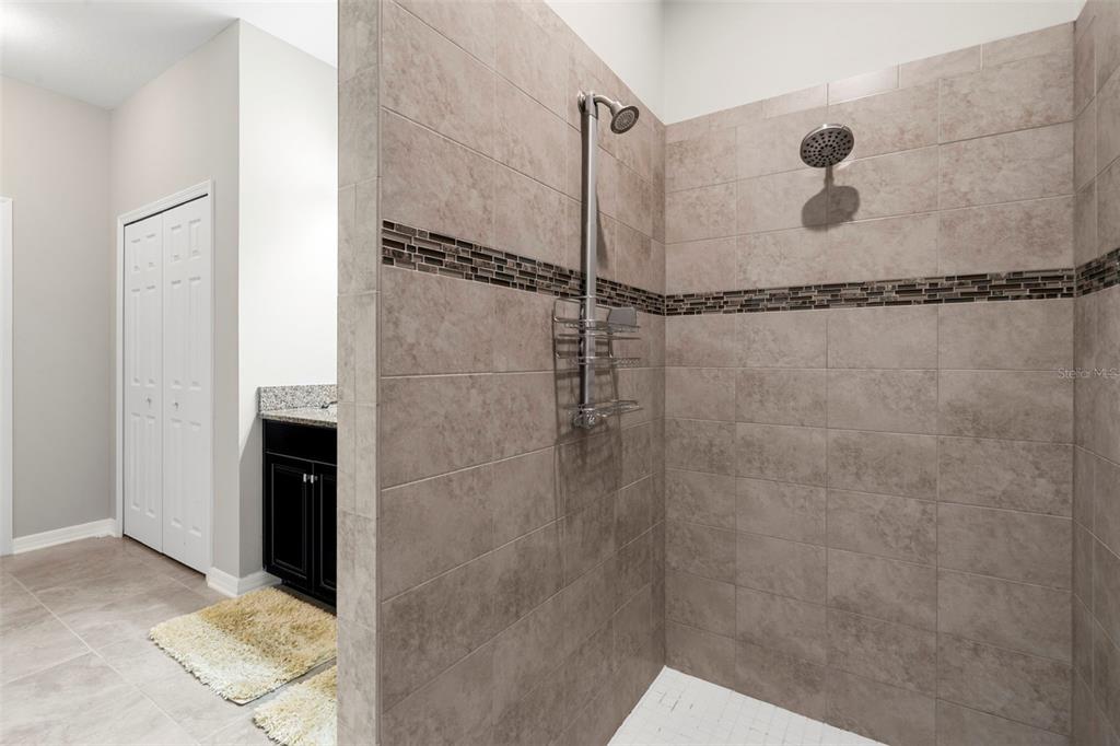 18565 Obregan Drive Spring Hill, FL 34610 - Photo 30 of 70 a bathroom with a shower