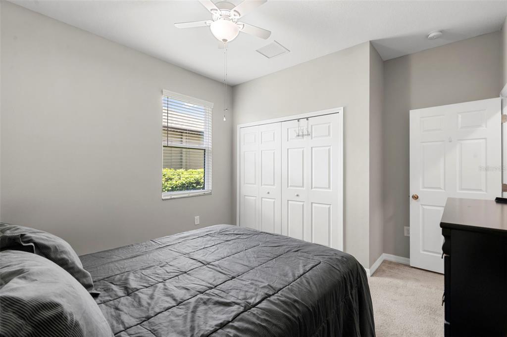 18565 Obregan Drive Spring Hill, FL 34610 - Photo 38 of 70 a bedroom with a bed and a window