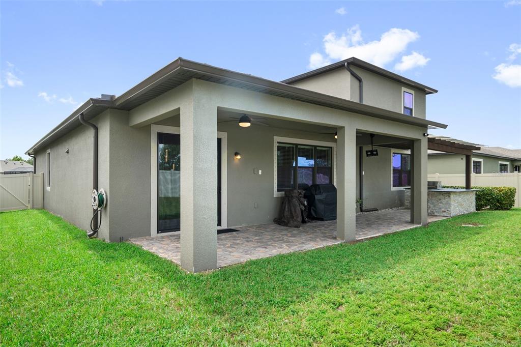 18565 Obregan Drive Spring Hill, FL 34610 - Photo 49 of 70 a view of a wooden house with a yard