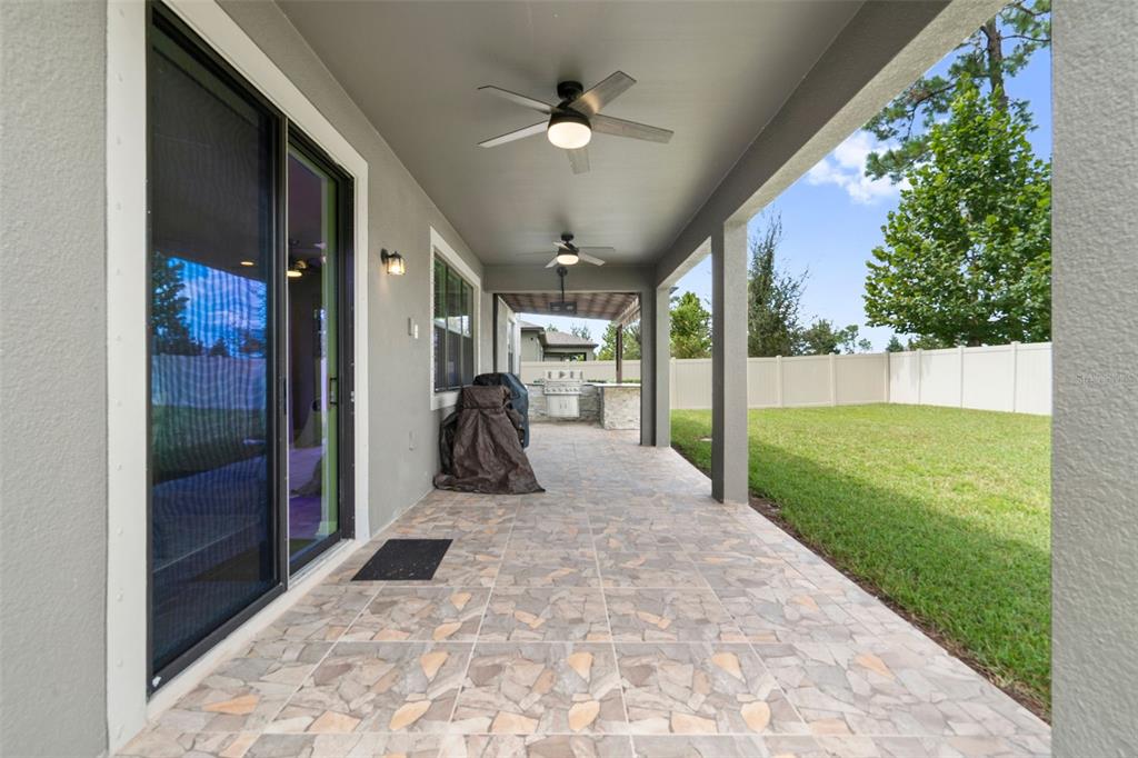 18565 Obregan Drive Spring Hill, FL 34610 - Photo 50 of 70 a view of a porch with a backyard
