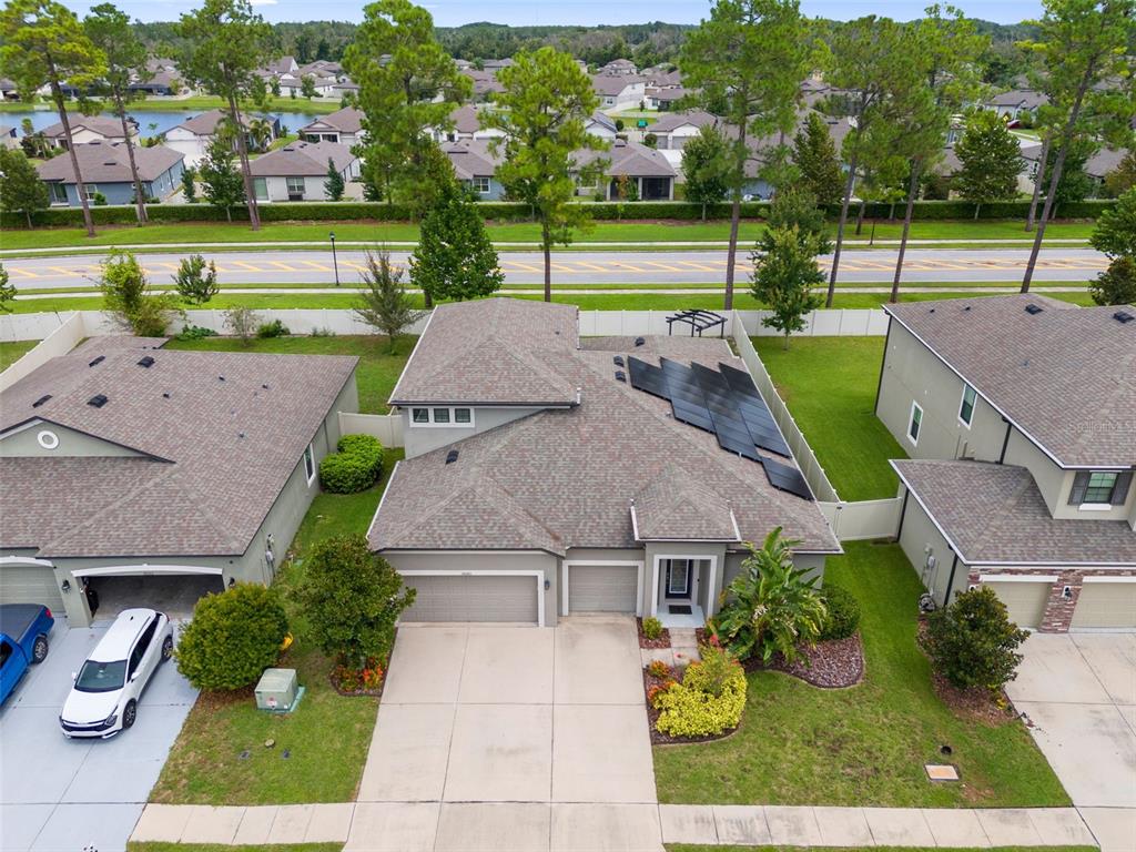 18565 Obregan Drive Spring Hill, FL 34610 - Photo 57 of 70 an aerial view of a house with a garden and yard