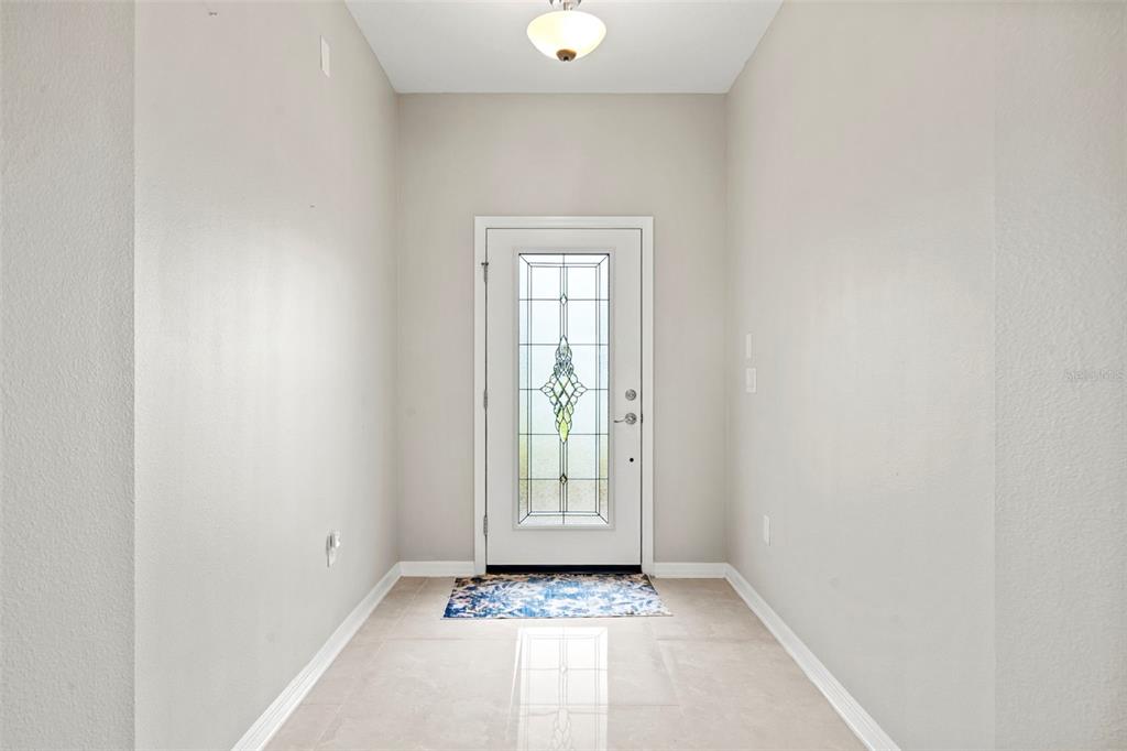 18565 Obregan Drive Spring Hill, FL 34610 - Photo 9 of 70 a view of an empty room and window