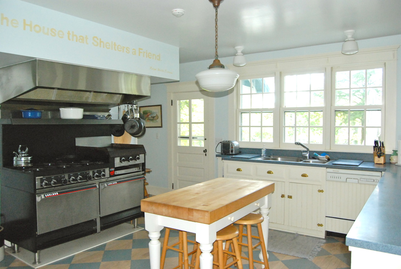 55 Eaton Road Monterey, MA 01245 - Photo 13 of 48 a kitchen with a stove a refrigerator and a sink