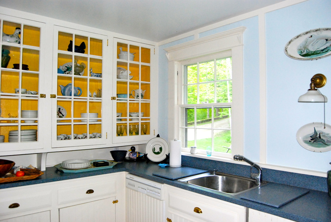 55 Eaton Road Monterey, MA 01245 - Photo 15 of 48 a kitchen with a sink and a window