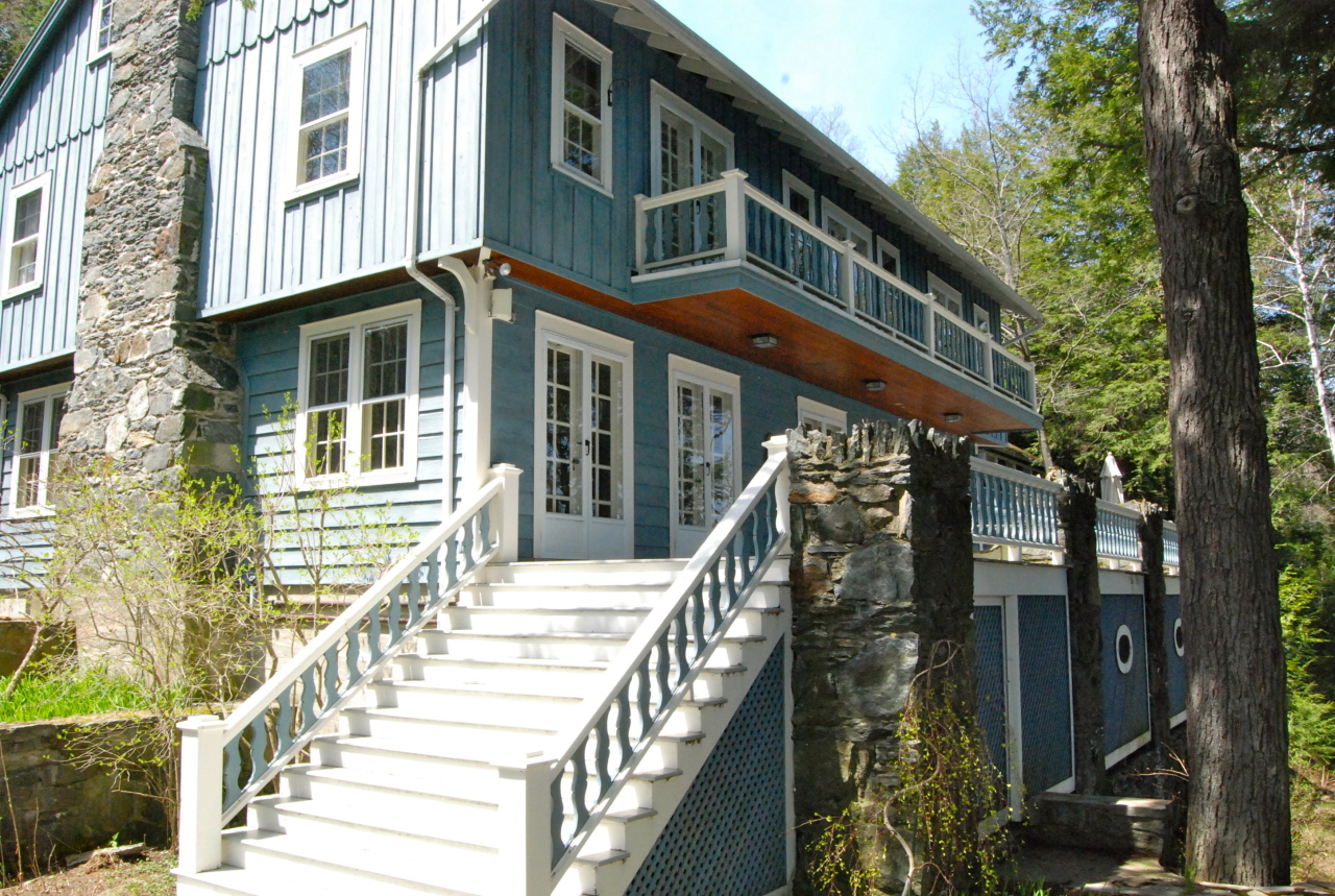 55 Eaton Road Monterey, MA 01245 - Photo 3 of 48 a view of a house with a small yard