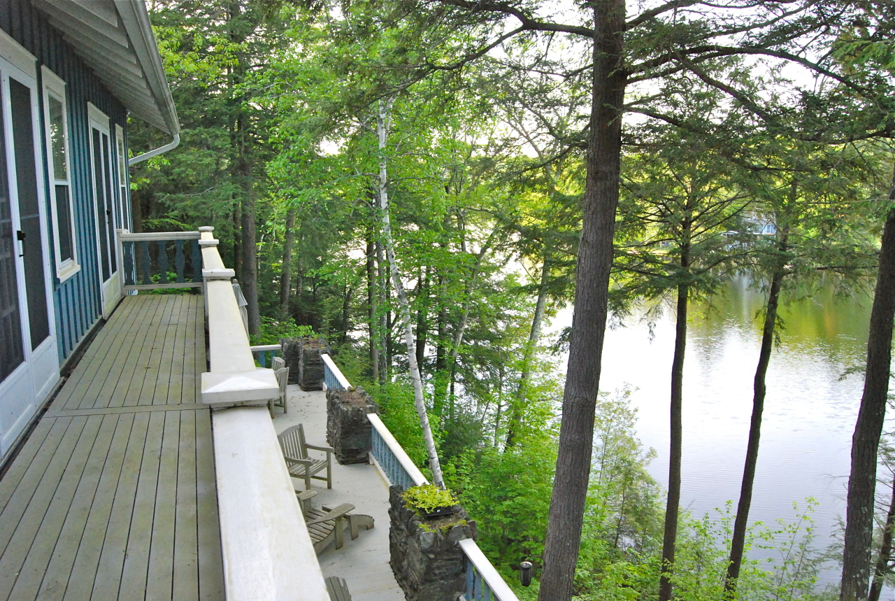 55 Eaton Road Monterey, MA 01245 - Photo 23 of 48 a view of balcony with furniture and garden