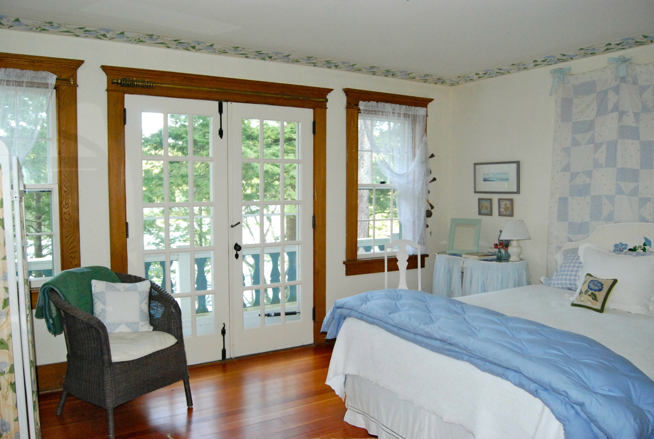 55 Eaton Road Monterey, MA 01245 - Photo 25 of 48 a spacious bedroom with furniture and a large window