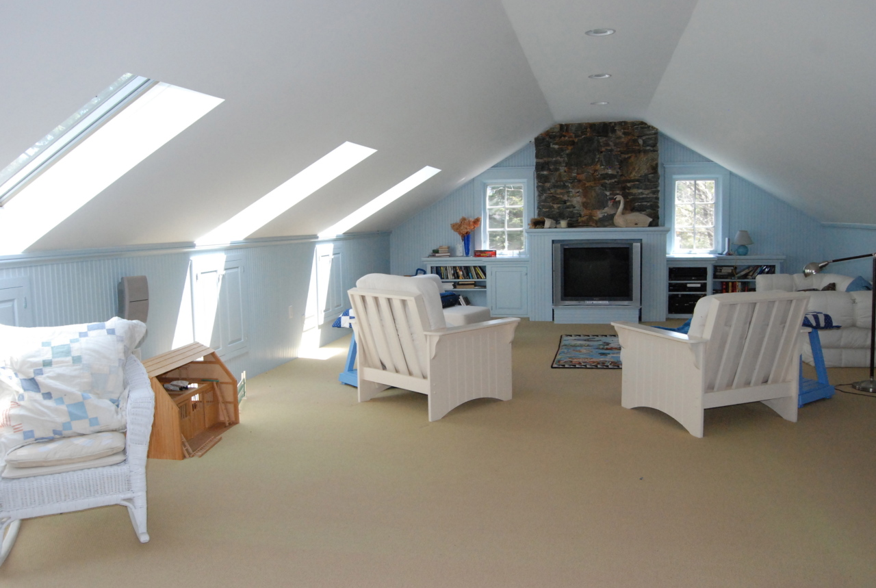 55 Eaton Road Monterey, MA 01245 - Photo 32 of 48 a living room with furniture and a fireplace