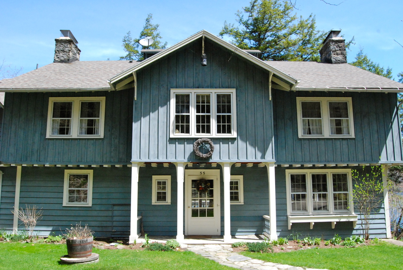 55 Eaton Road Monterey, MA 01245 - Photo 5 of 48 a front view of a house with garden