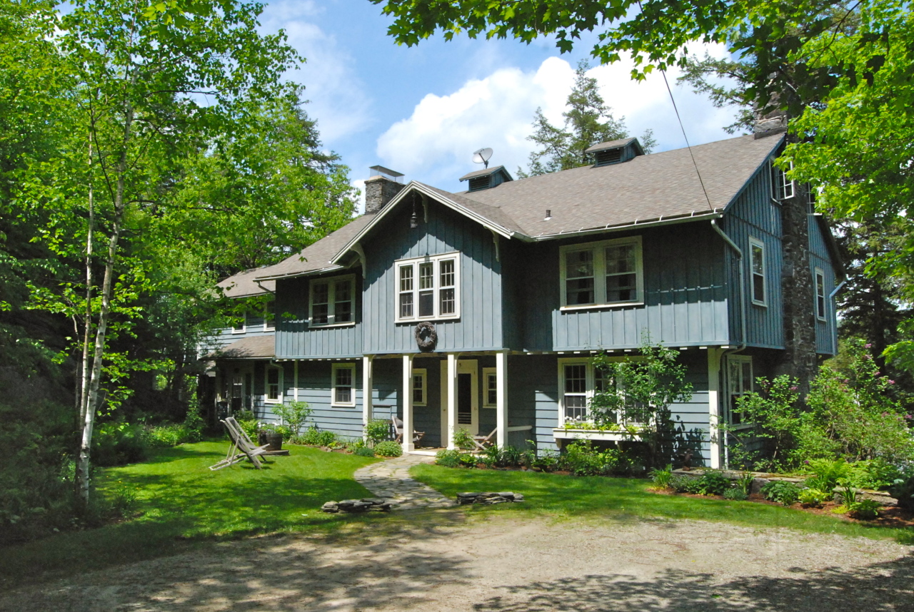 55 Eaton Road Monterey, MA 01245 - Photo 48 of 48 a front view of a house with a yard