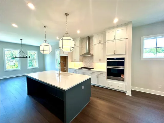 a view of a dining room and wooden floor