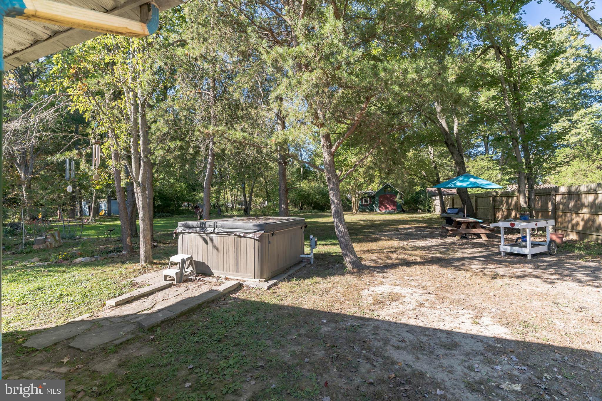 15809 Menk Road Accokeek, MD 20607 - Photo 25 of 30 Backyard with hot tub