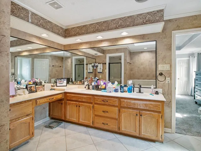 a bathroom with a bathtub and shower