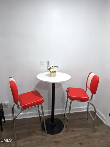 a room with furniture and a chair