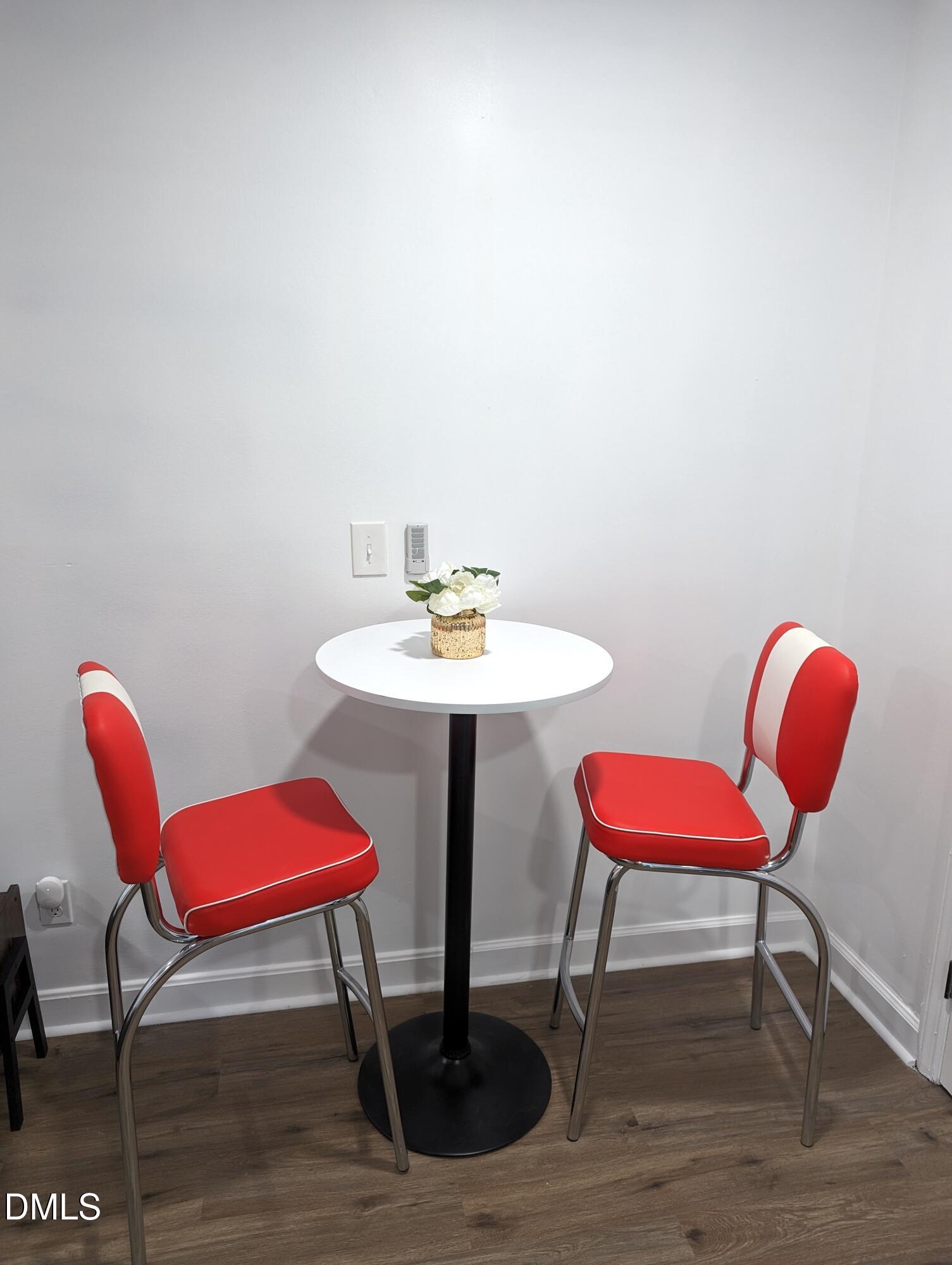 4816 Whitehall Avenue Raleigh, NC 27604 - Photo 19 of 23 a room with furniture and a chair