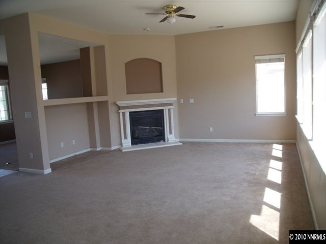 1327 Rouge River Road Fernley, NV 89408 - Photo 5 of 9 an empty room with windows