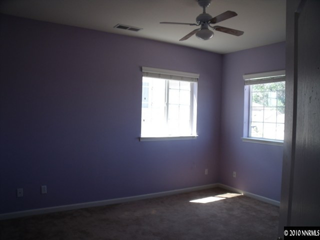 1327 Rouge River Road Fernley, NV 89408 - Photo 6 of 9 an empty room with a window