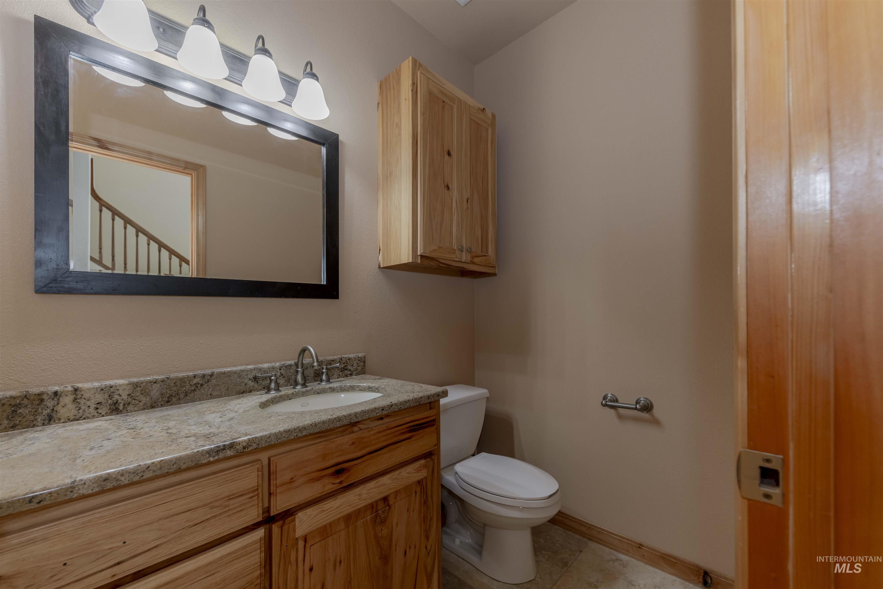 7591 Pheasant Chase Drive Lewiston, ID 83501 - Photo 12 of 32 Bathroom featuring vanity and light tile patterned floors