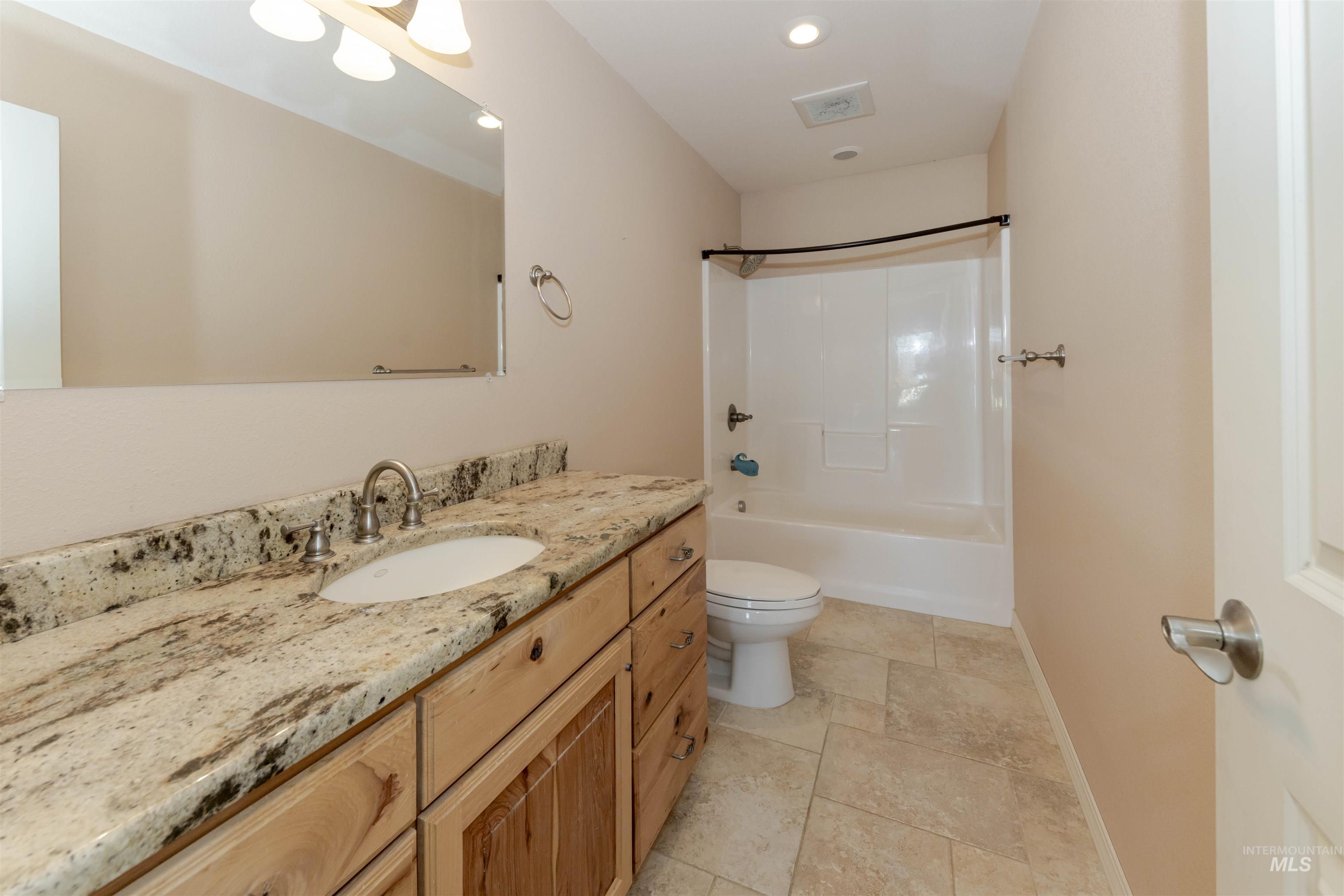 7591 Pheasant Chase Drive Lewiston, ID 83501 - Photo 17 of 32 Bathroom featuring vanity, shower / tub combination, and recessed lighting