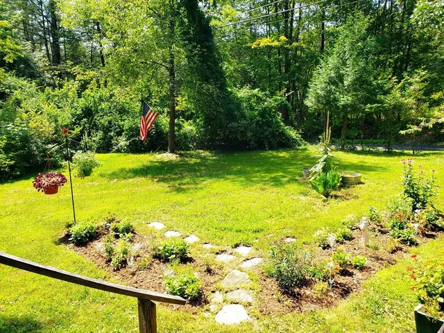 a view of swimming pool from a yard