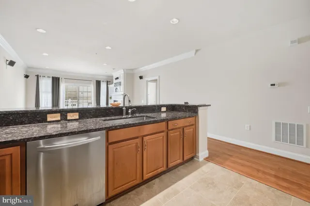 a large bathroom with double vanity and a mirror