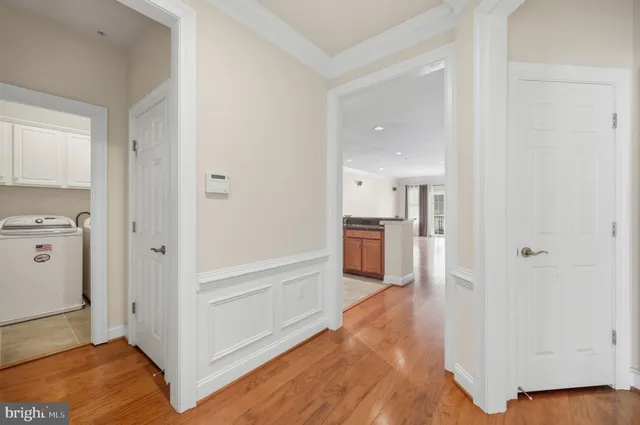 a view of a kitchen cabinets and wooden floor