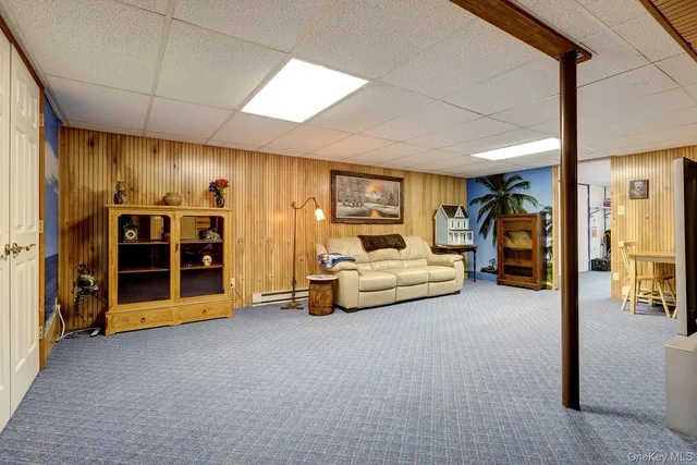 a view of a livingroom with furniture and a furniture