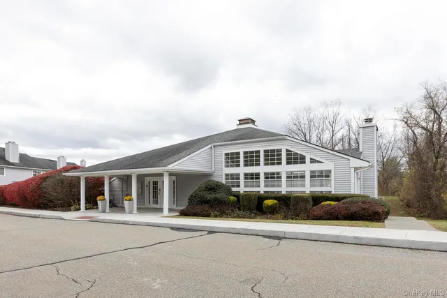 a view of a large building with a big yard