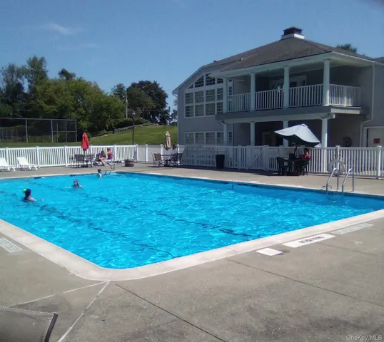 a couple of flower plants sitting in middle of a field