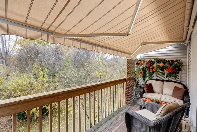 a view of a porch with furniture