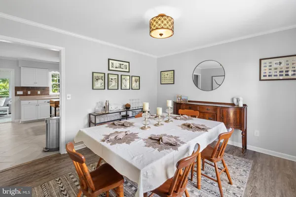 a view of a dining room and a table