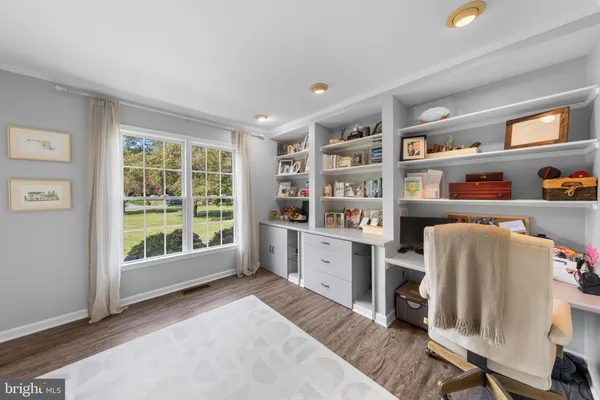 a room with furniture and a window