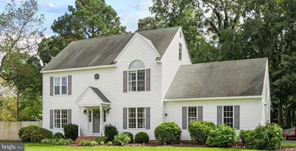 front view of house with a yard