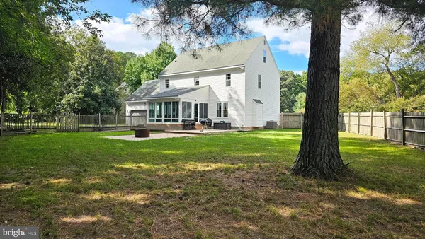 a view of a house with a big yard