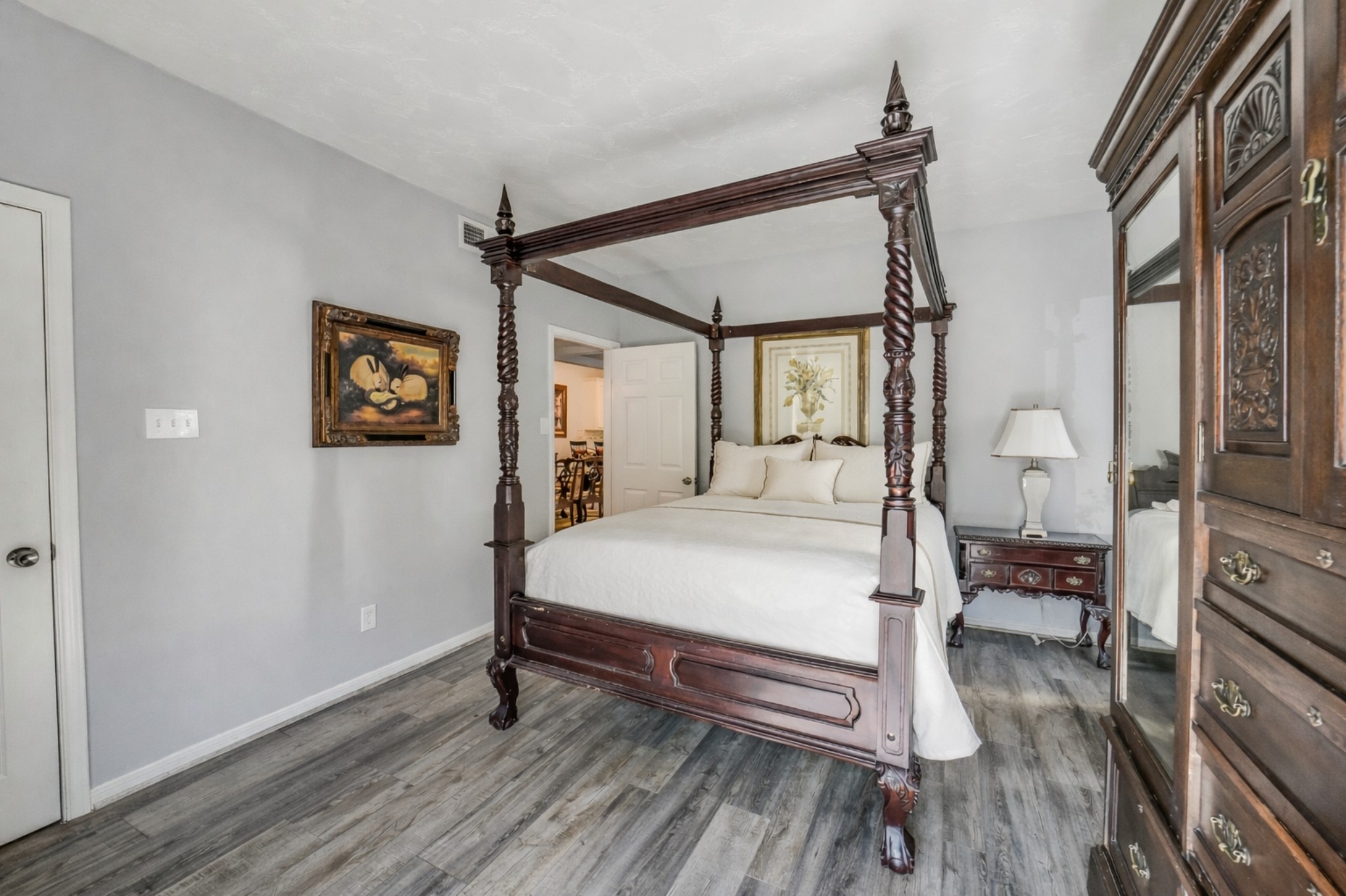 2100 Tanglewilde Street, Unit 591 Houston, TX 77063 - Photo 9 of 18 Large primary bedroom Generous proportions allow for a king-sized bed and additional furnishings with ease.