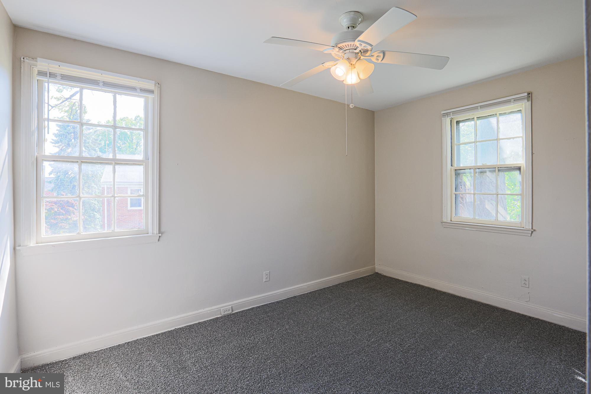 3914 Bancroft Road Baltimore, MD 21215 - Photo 15 of 25 an empty room with windows and fan