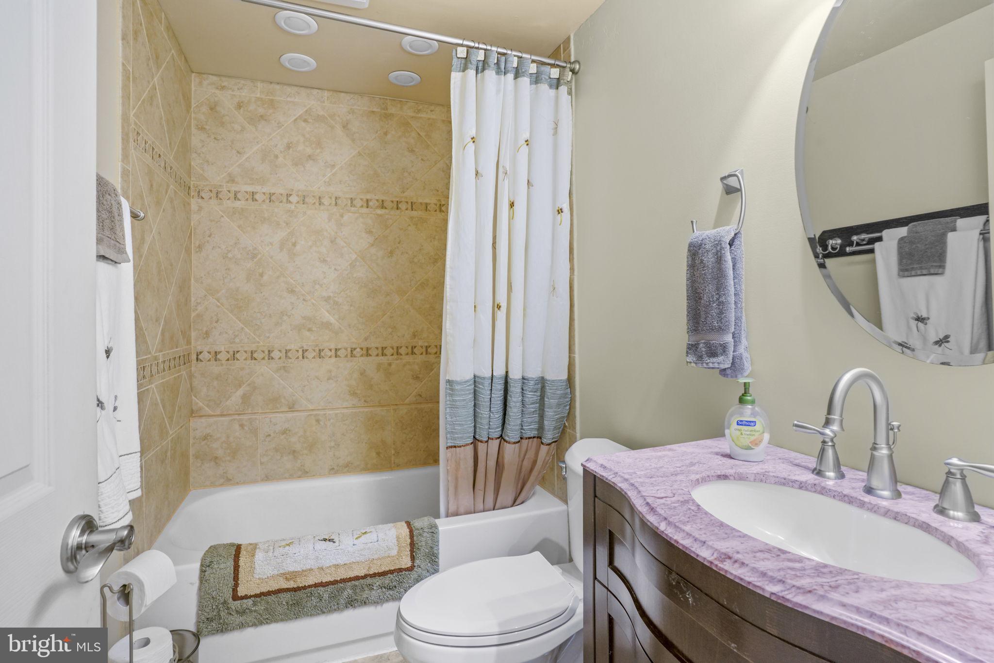 718 Mimosa Cove Road Deale, MD 20751 - Photo 12 of 47 Main level full bath