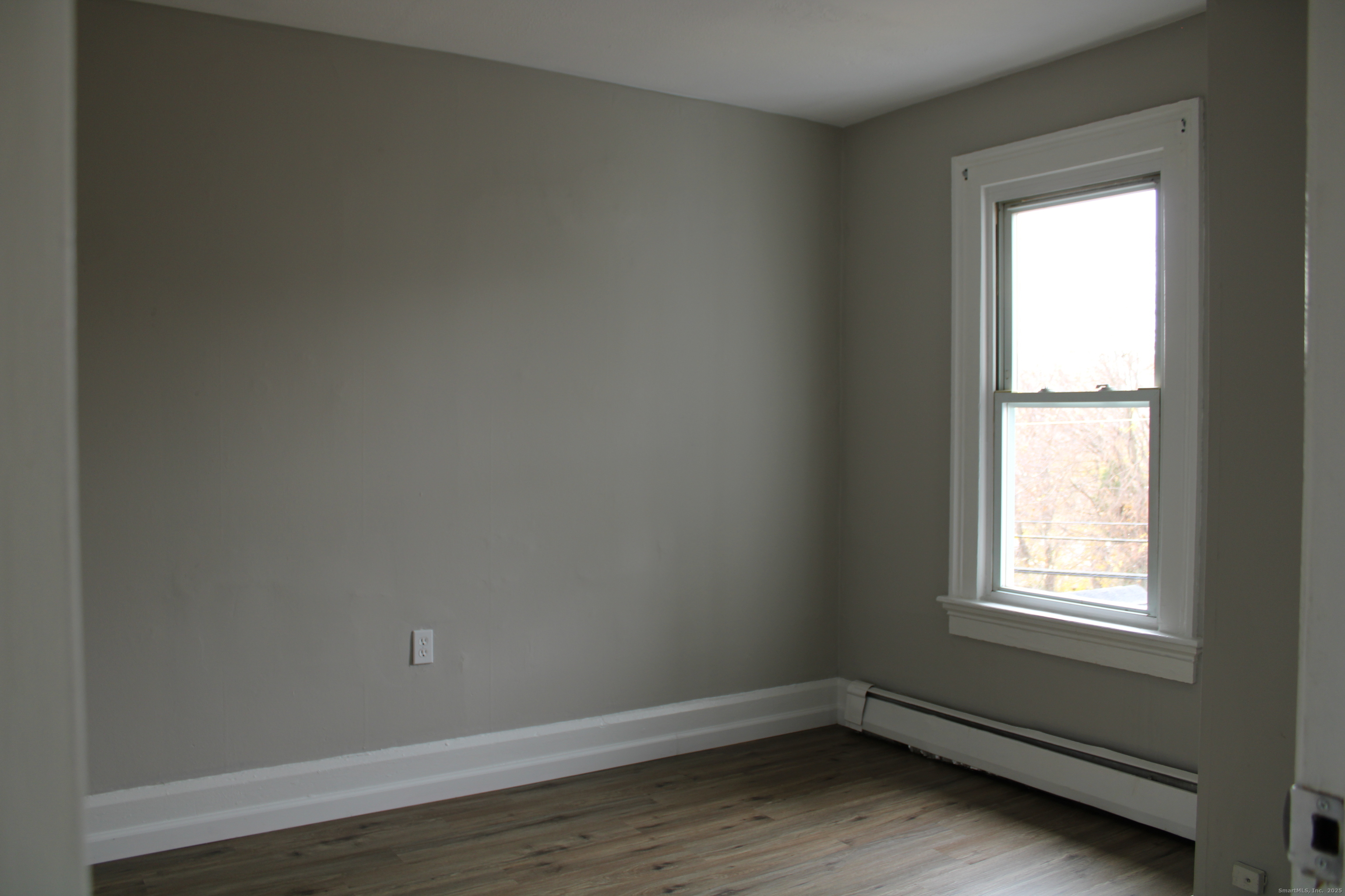 42 Summer Street, Unit 5 Bristol, CT 06010 - Photo 8 of 15 an empty room with a window