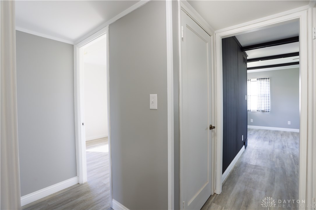 1627 Joselin Road Dayton, OH 45432 - Photo 14 of 28 Hallway leading to inviting rooms with durable flooring and crisp wall finishes.