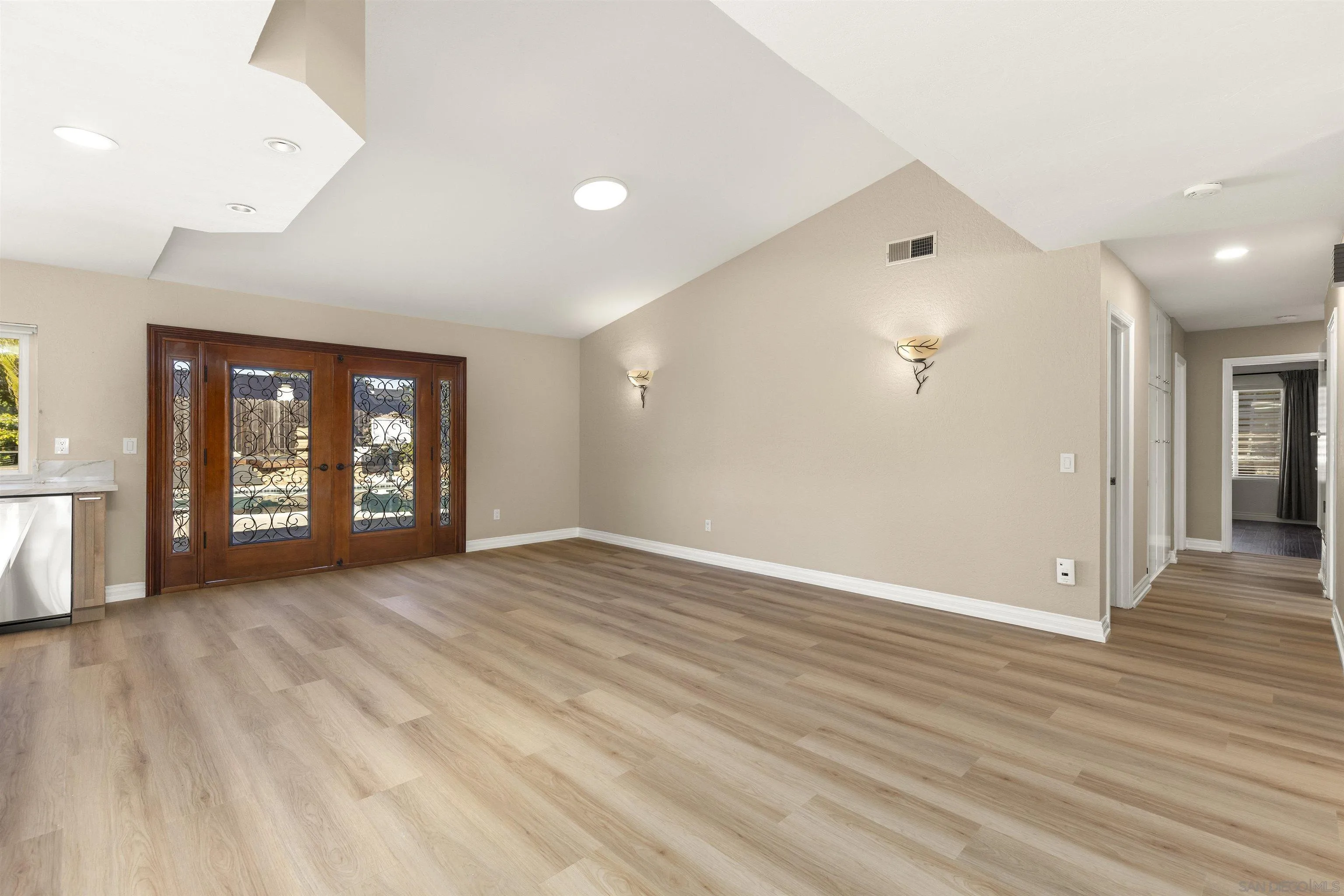 1510 Orangeview Drive, Unit 12 Encinitas, CA 92024 - Photo 17 of 55 wooden floor in an empty room with a window