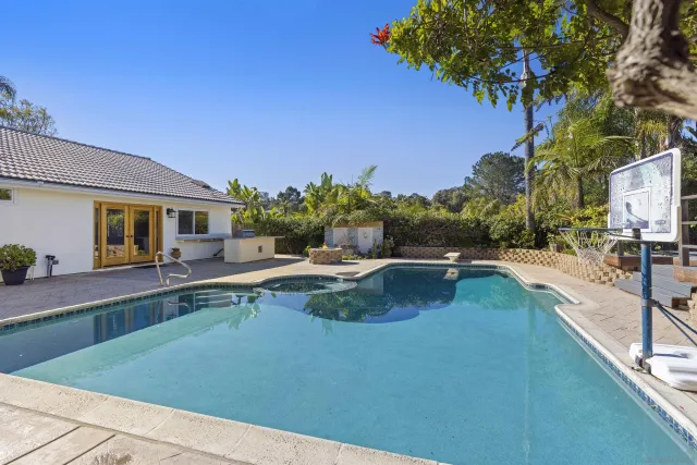 a view of swimming pool from a balcony
