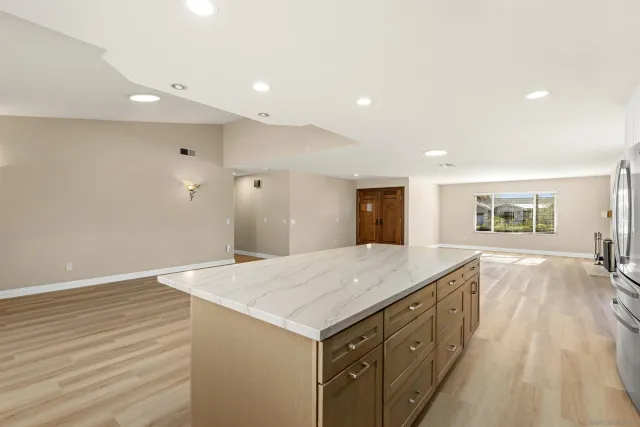 a living room with furniture white walls and white walls